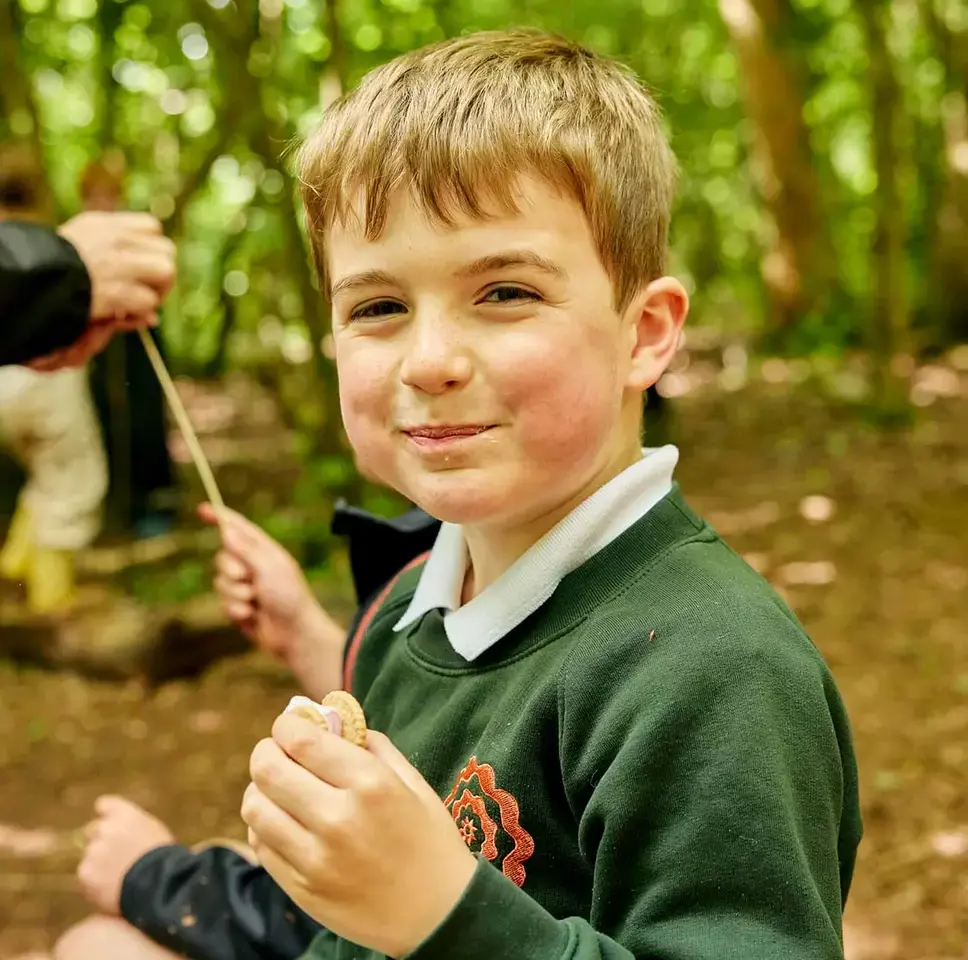 Boy in forest school