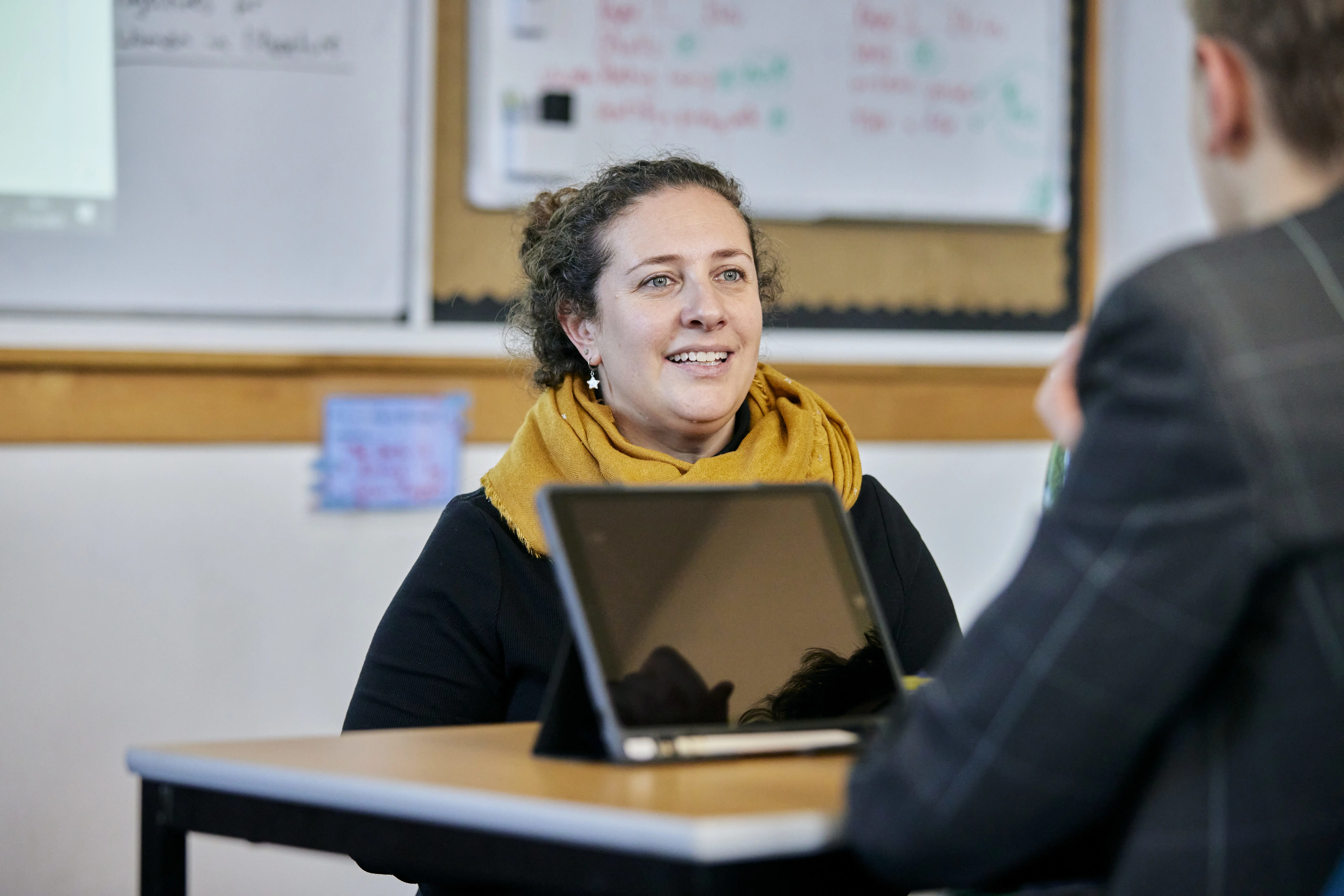 English teacher Mrs Pippa Lyons-White offering one-to-one support to a Senior School pupil, at Clifton High School, an independent school in Bristol