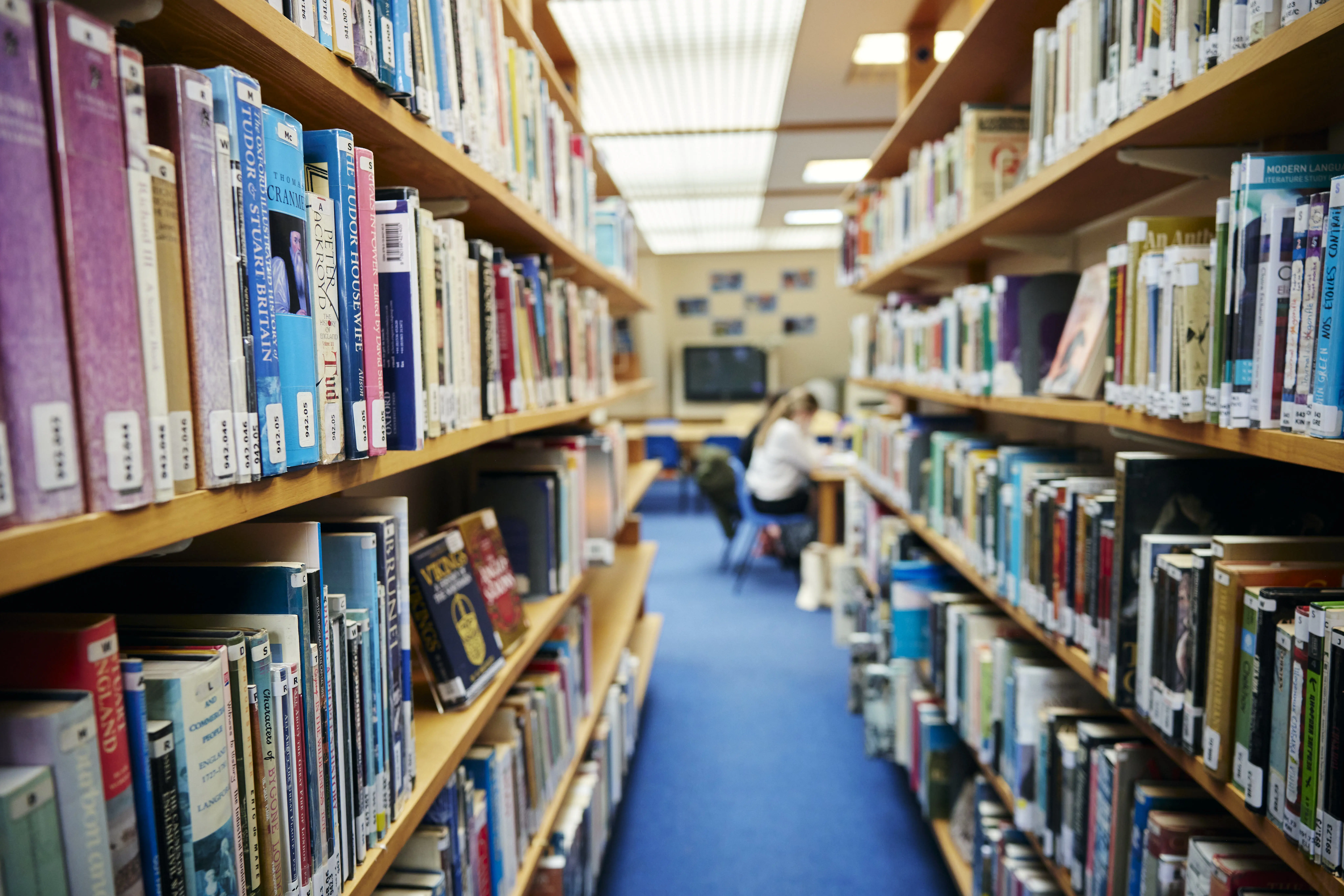 Bookshelves and study areas in the Senior School Library at Clifton High School.